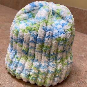 Soft baby hat with brim.